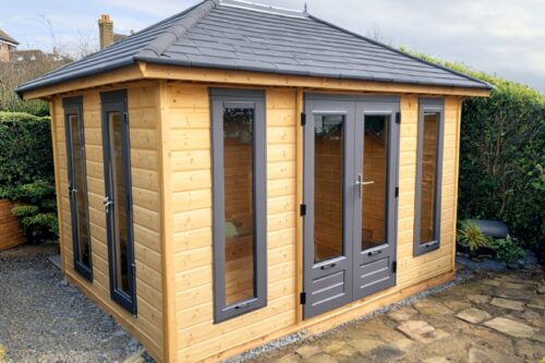 Garden-cabin-full-length-PVC-windows-double-doors-slated -tiled-roof