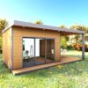 Garden room with a covered outdoor terrace, ideal for year-round relaxation and entertaining.