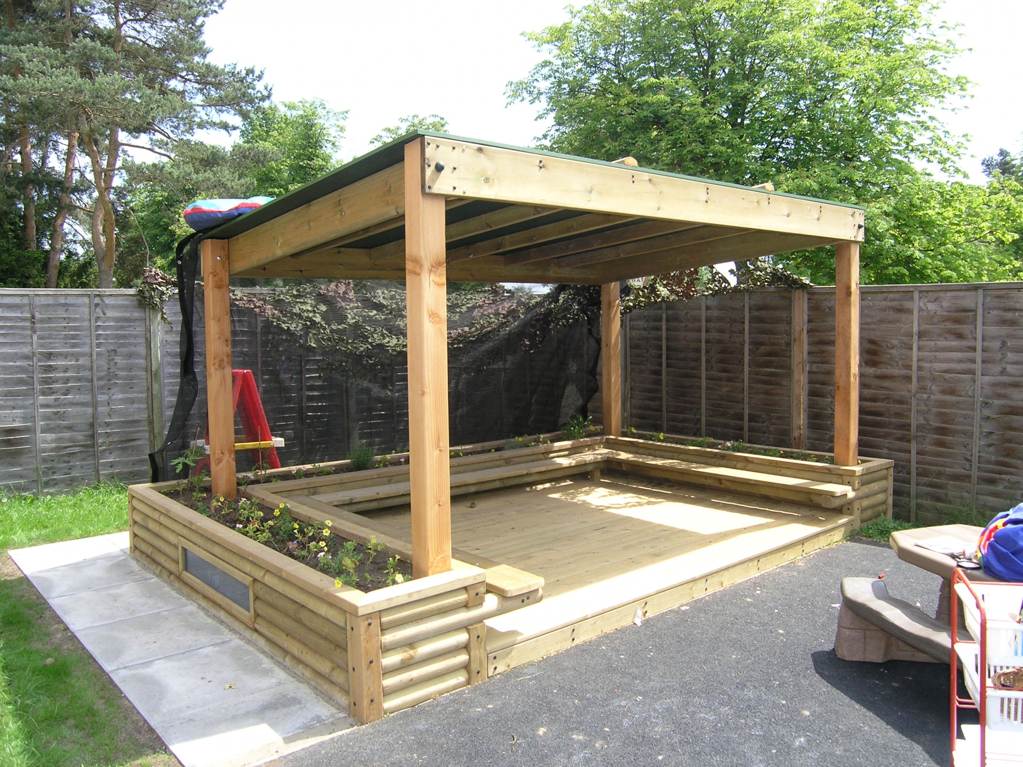 Timber outdoor classroom with covered seating area for schools